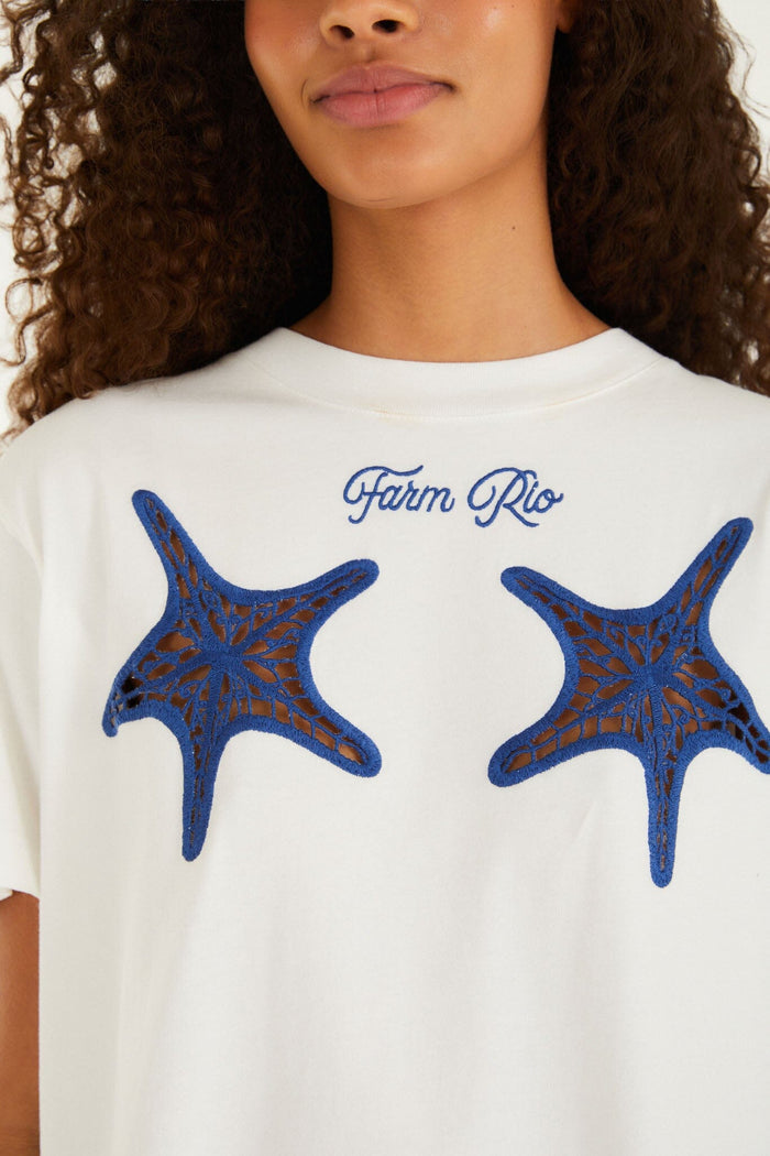 FARM Rio model wearing the White Farm Rio Starfish Cut-Out Organic Cotton T-Shirt