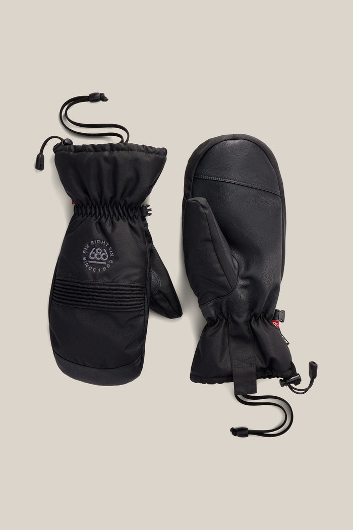 A pair of 686 Men’s Lander™ Mitts in black, featuring insulated construction and adjustable wrist cords. One mitten displays the palm side while the other shows the back with a small circular 686 logo; both have a durable, textured surface.