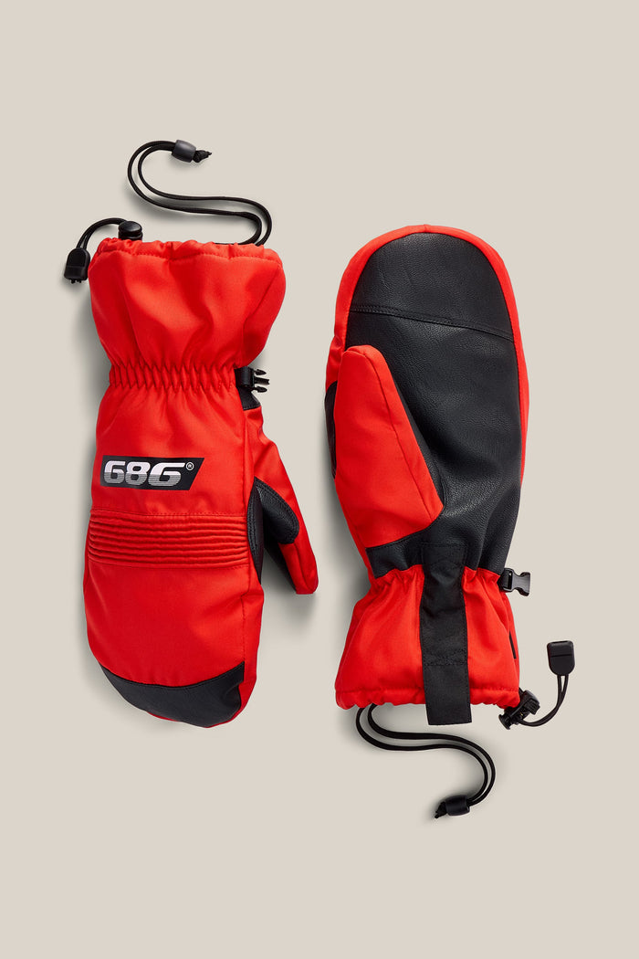 A pair of 686 Men’s Lander™ Mitts in red and black, featuring black palms, adjustable wrist straps, and clips. One mitten showcases a 686 logo patch on the back. The mittens are laid flat on a beige background.