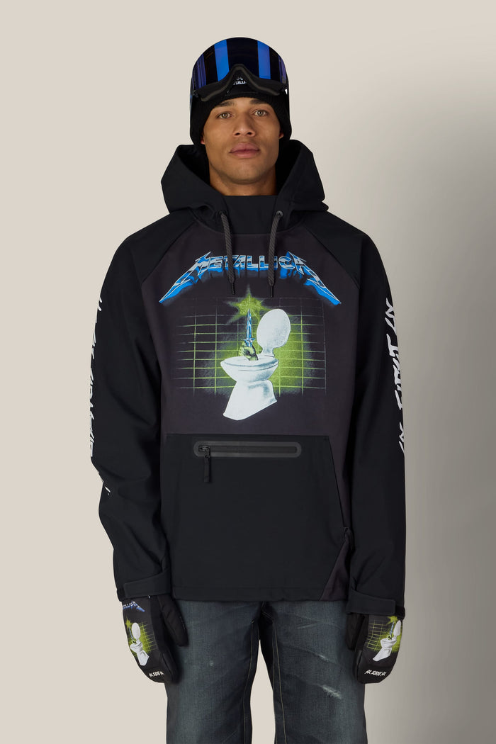 A person wearing a black 686 Men’s Metallica Waterproof Hoody with a Metallica graphic of a toilet and a grid pattern, paired with a matching beanie, ski goggles, and gloves.