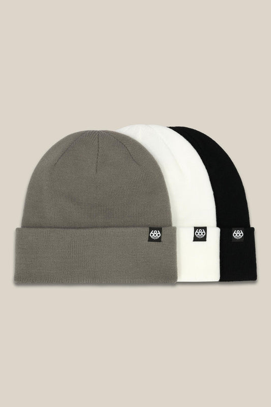 The 686 Standard Roll-Up Beanie (3-Pack) by 686 includes gray, white, and black knit beanies with a small black rectangular logo tag on the front cuff, shown side by side on a neutral background.