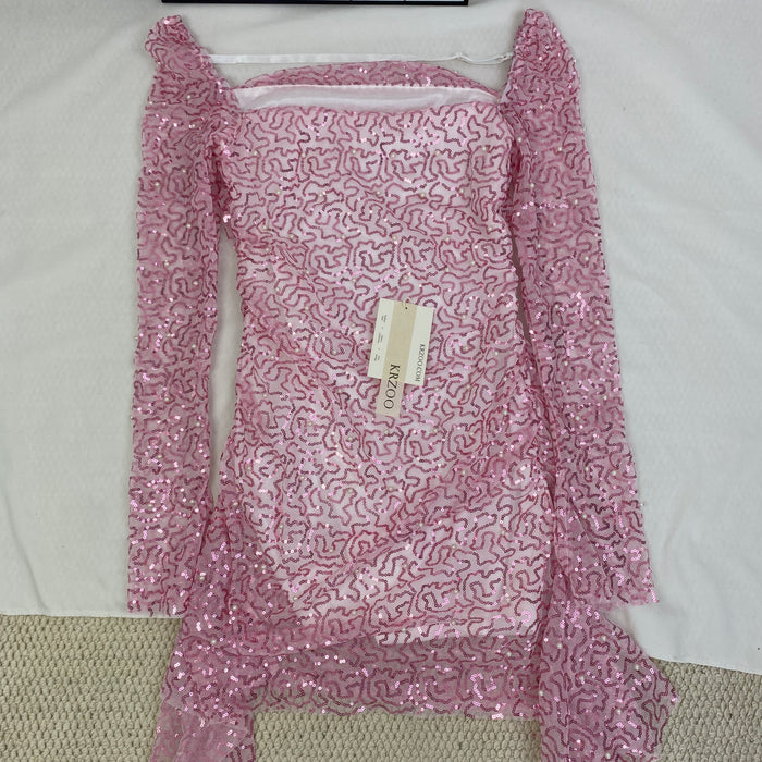 A slimming, soft pink, figure-hugging dress