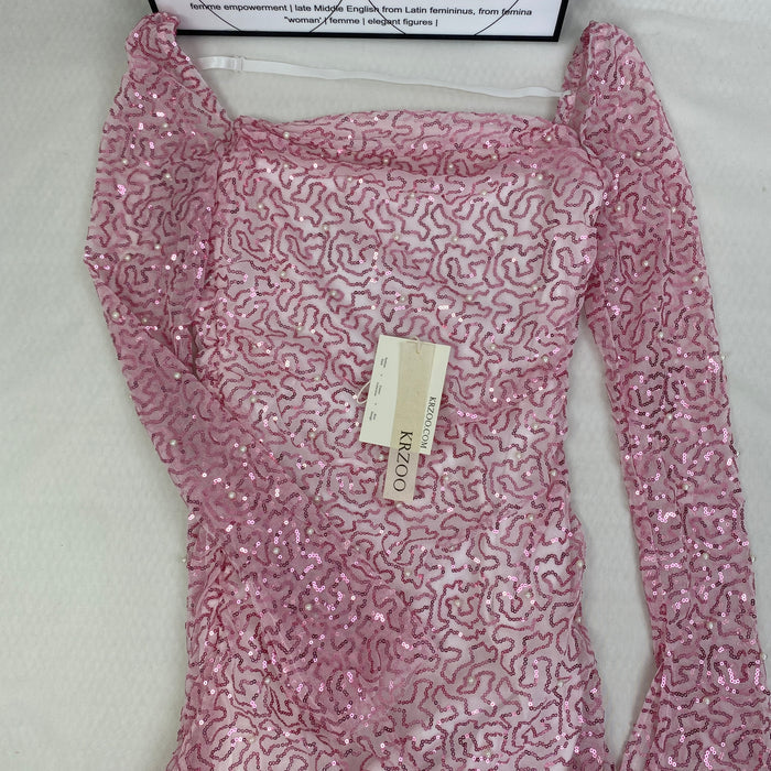 A slimming, soft pink, figure-hugging dress