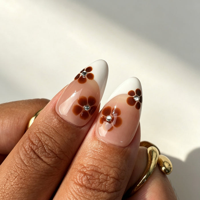 Soft romantic almond press on nails, nude pink, brown flower, white French tip, gold frame, 3D flower, leopard tip, rhinestone and pearl