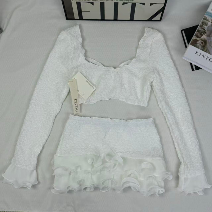 Blouse with wooden earflaps and half-skirt set