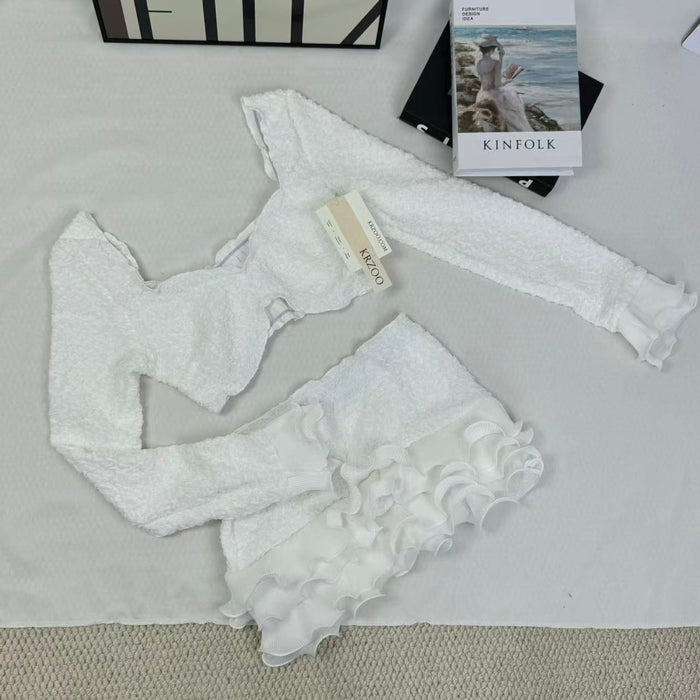 Blouse with wooden earflaps and half-skirt set