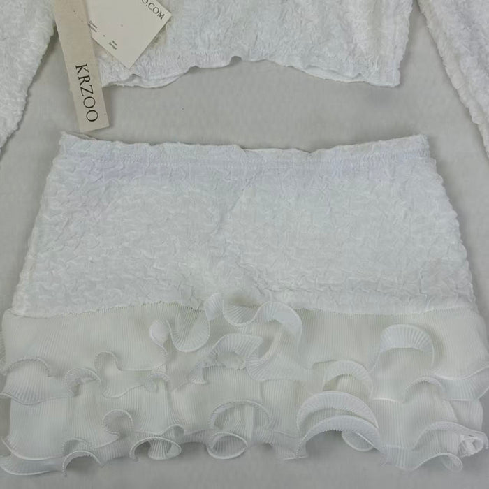 Blouse with wooden earflaps and half-skirt set