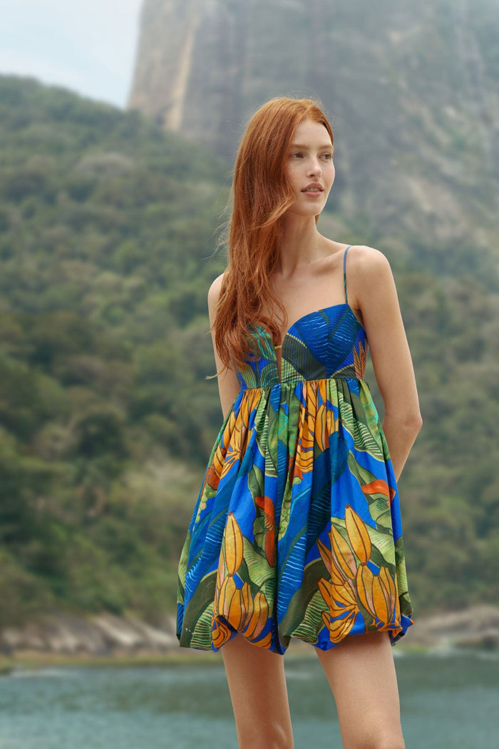 FARM Rio model wearing the Blue Banana Grapes Sleeveless Organic Cotton Mini Dress
