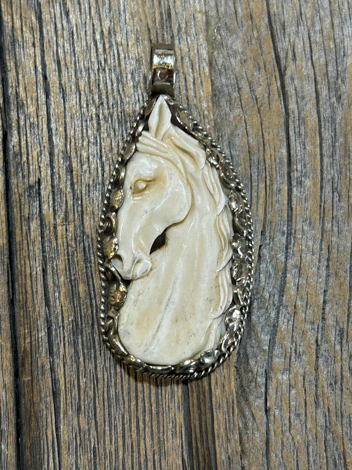CARVED BONE HORSE PENDANT