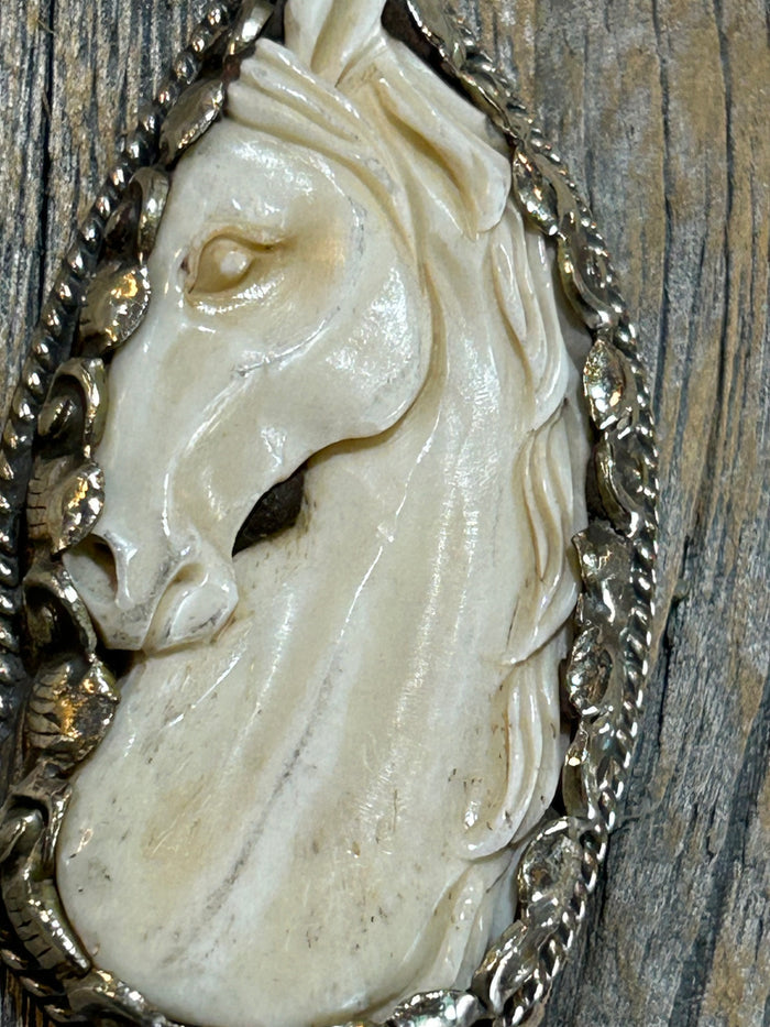 CARVED BONE HORSE PENDANT
