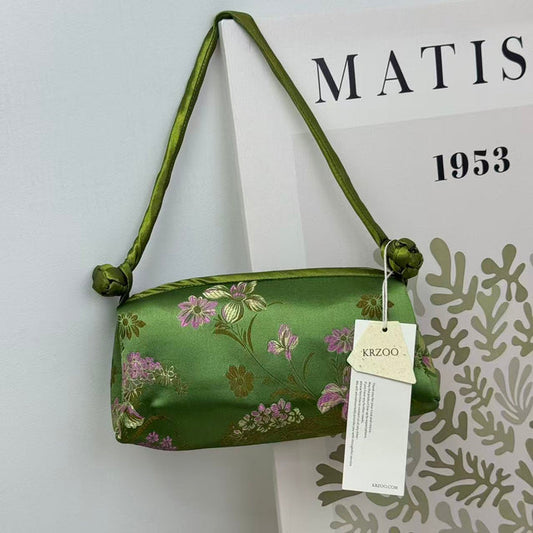 Classical style buttoned handbag