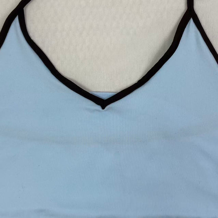 Contrasting color tie-neck sling-neck top