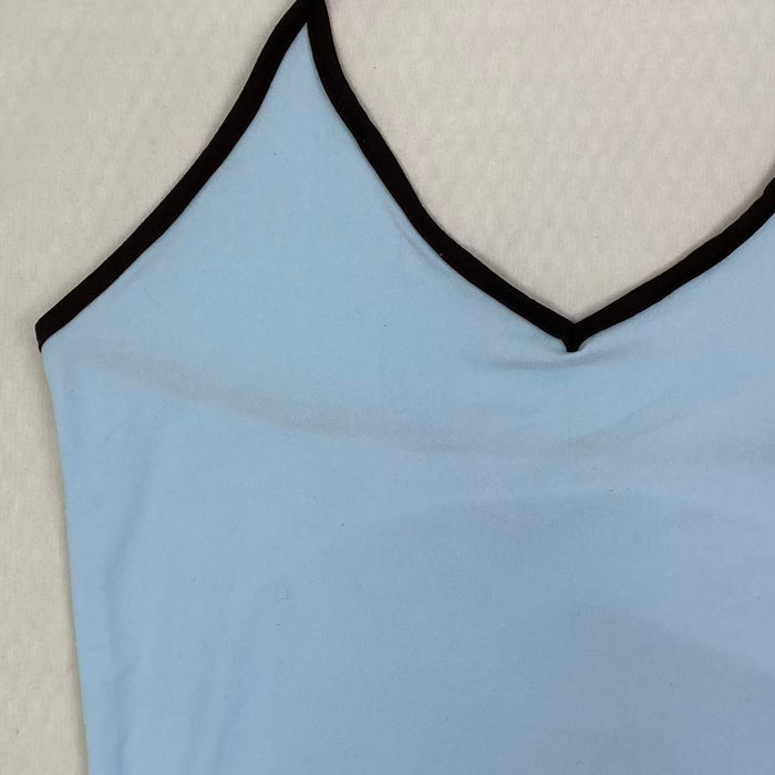 Contrasting color tie-neck sling-neck top