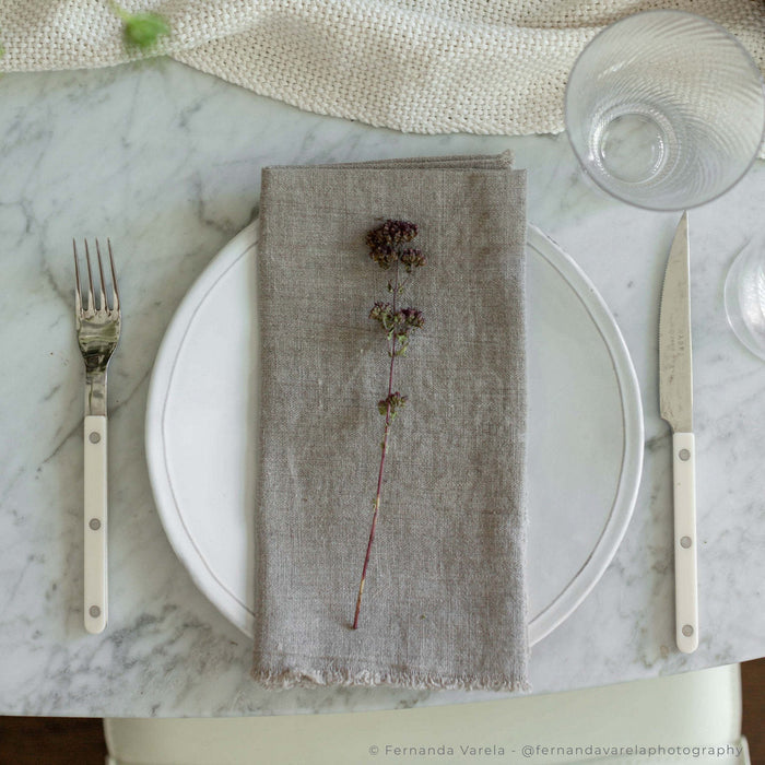 Fringed Linen Napkin — in a styled setting
