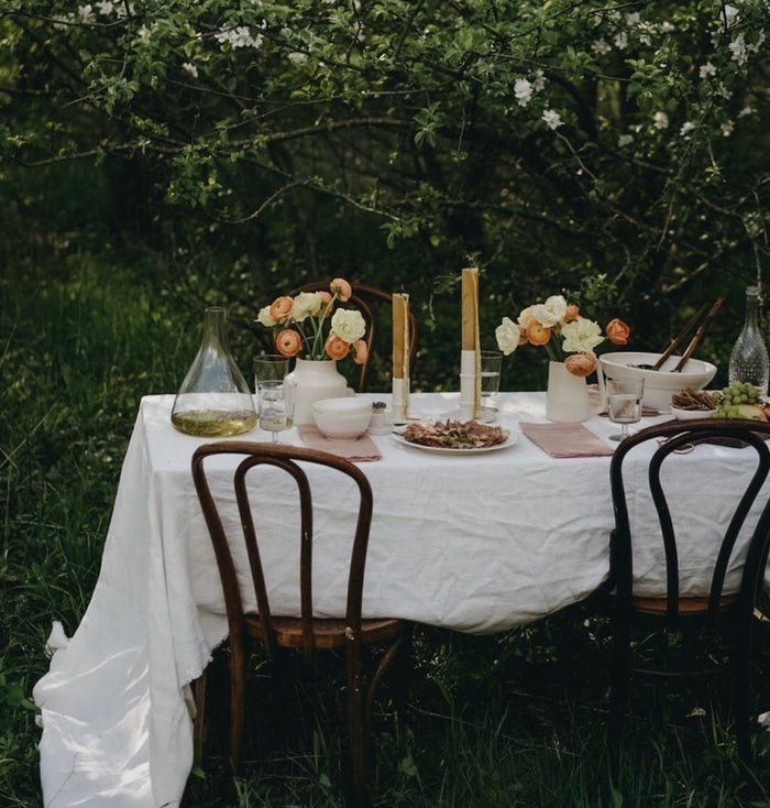 Fringed Linen Tablecloth — in a styled setting