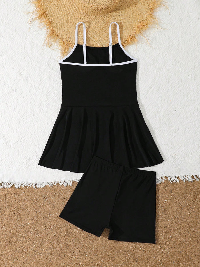 Girls Black Skirted Swimsuit Set, Strappy Swim Dress with Matching Shorts and White Side Details