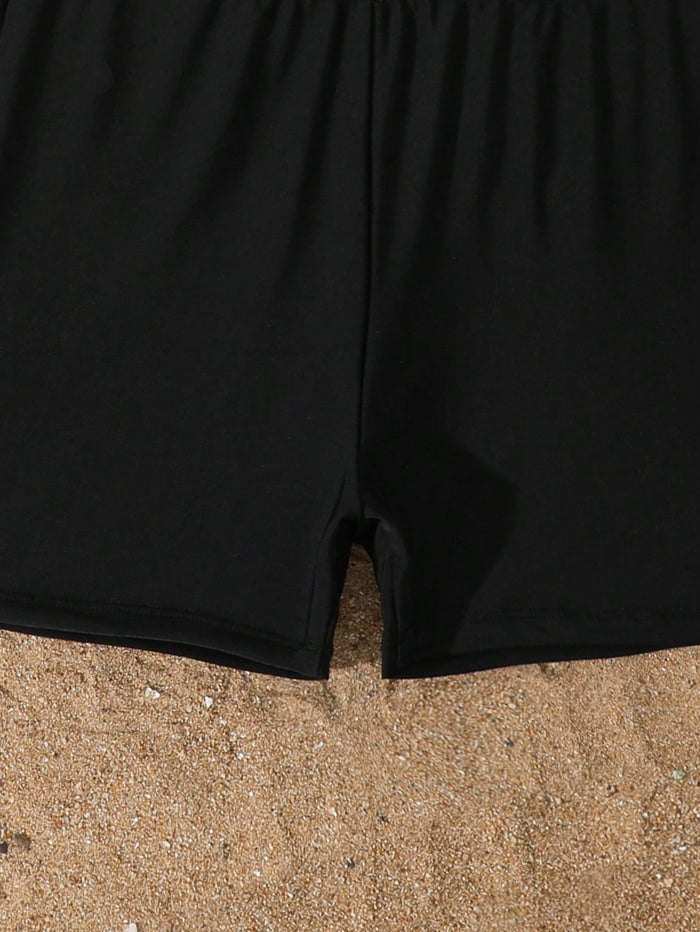 Girls Black Skirted Swimsuit Set, Strappy Swim Dress with Matching Shorts and White Side Details