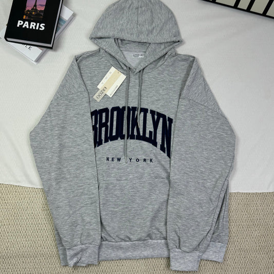 Hooded sweatshirt is loose