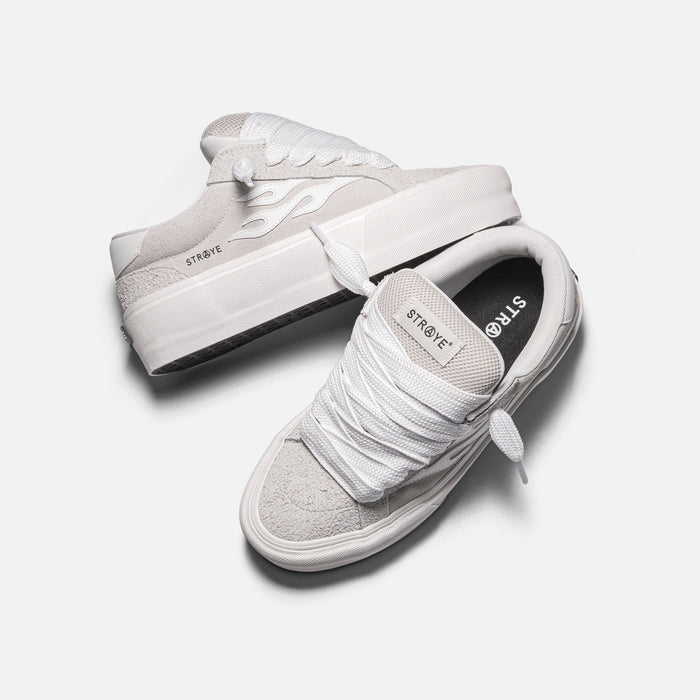 STRAYE Logan Stomper Cream – angled lifestyle photo platform sneaker