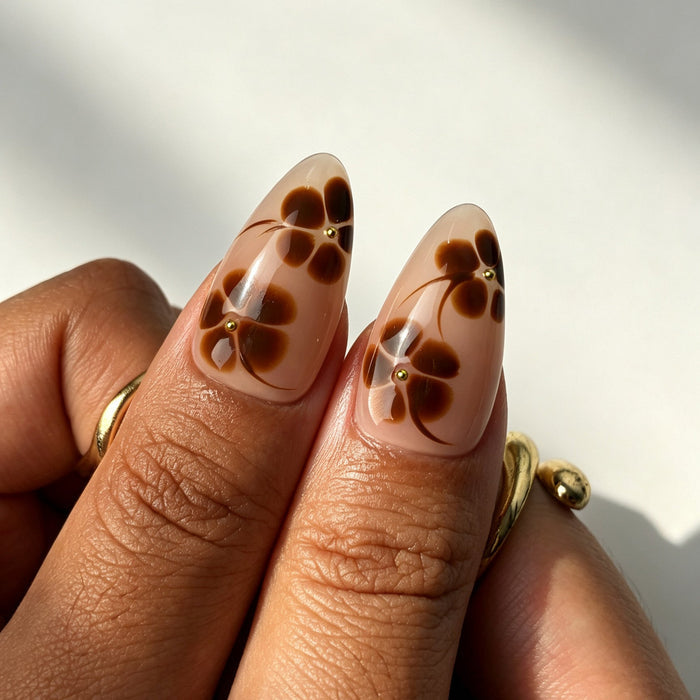 Warm vintage almond press on nails, nude pink, brown flower, gold bead, white French tip, gold swirl and tortoiseshell print