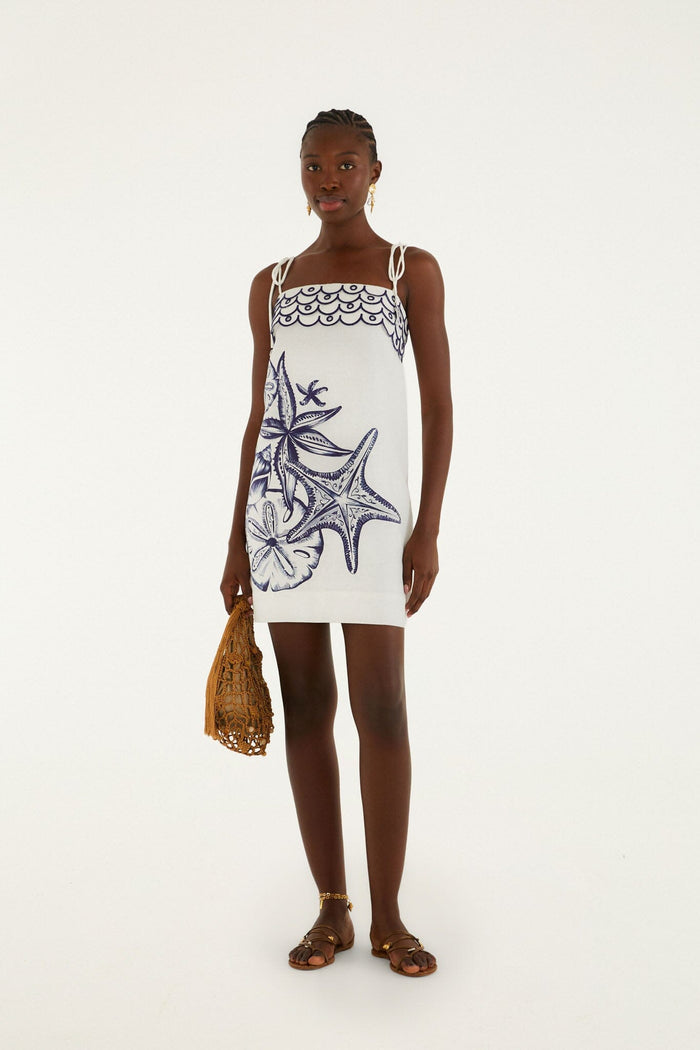 FARM Rio model wearing the Off-White Coast Stars Euroflax Premium Linen Mini Dress