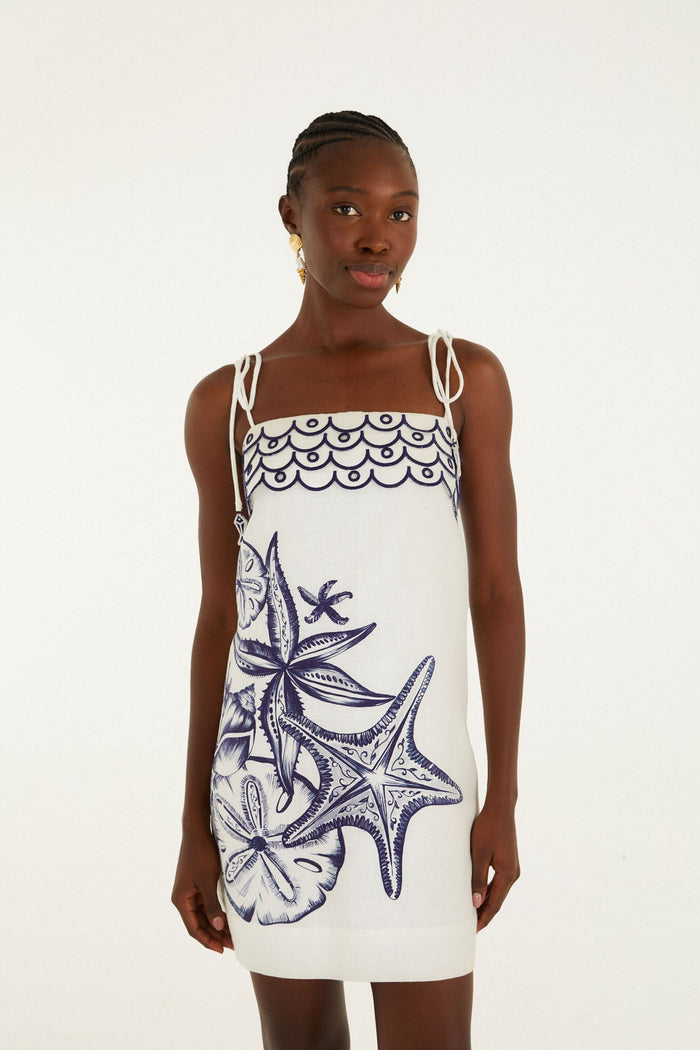 FARM Rio model wearing the Off-White Coast Stars Euroflax Premium Linen Mini Dress