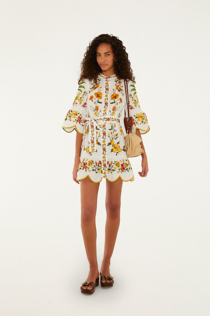 FARM Rio model wearing the Lemon Bouquet Off-White Mini Dress
