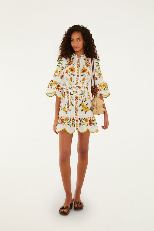 FARM Rio model wearing the Lemon Bouquet Off-White Mini Dress