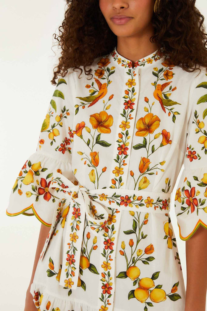 FARM Rio model wearing the Lemon Bouquet Off-White Mini Dress