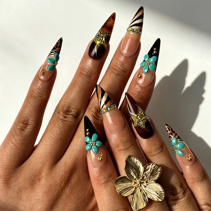 Hands wearing September 2026 fall ombre press‑on nails leopard print long stiletto nails