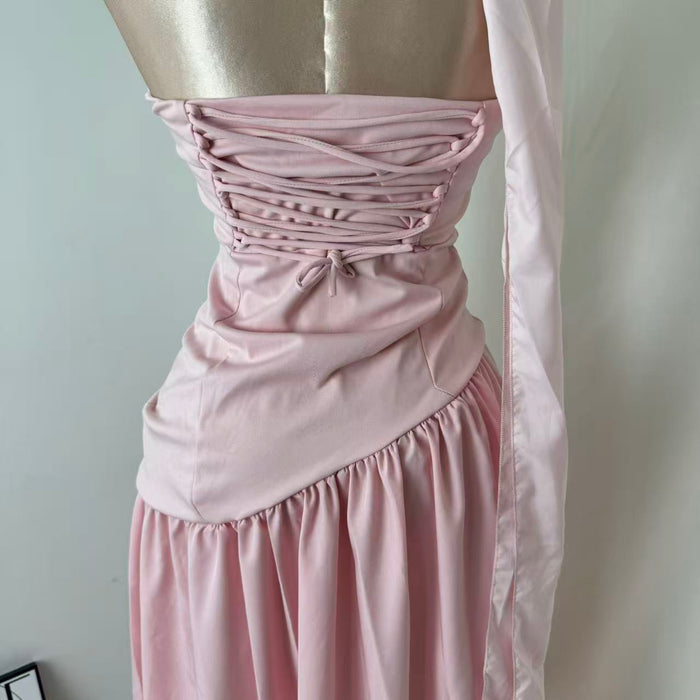 Pink-belted strapless dress