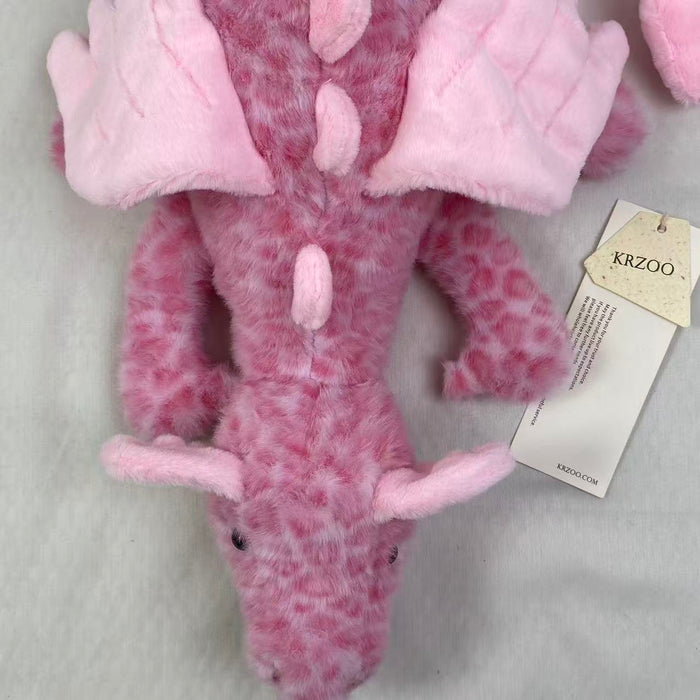 Pink little dragon doll