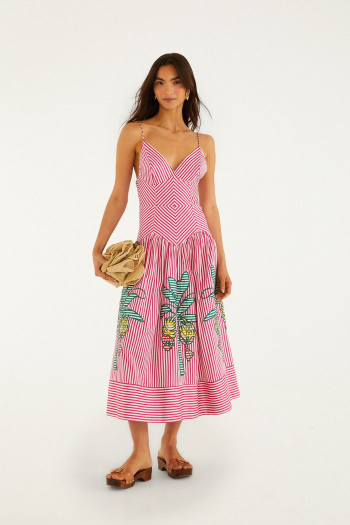 FARM Rio model wearing the Red Palm Tree Stripes Cutwork Organic Cotton Midi Dress