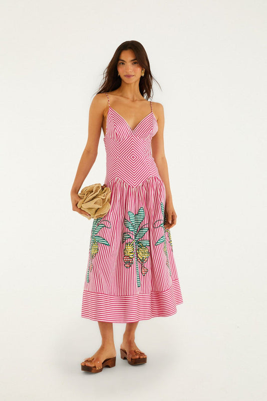 FARM Rio model wearing the Red Palm Tree Stripes Cutwork Organic Cotton Midi Dress