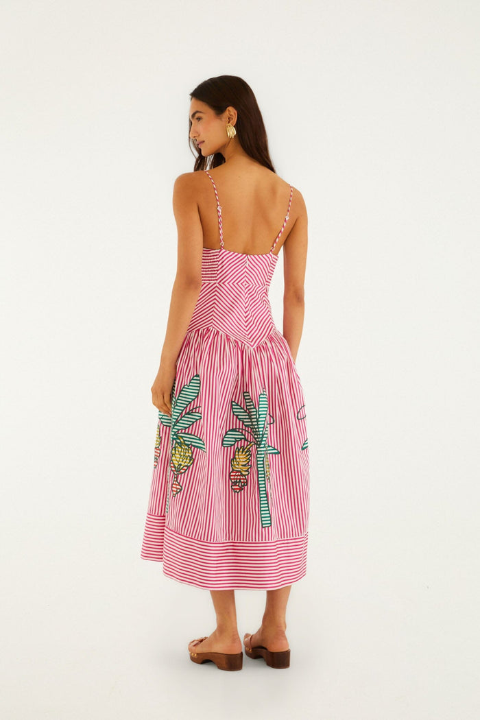 FARM Rio model wearing the Red Palm Tree Stripes Cutwork Organic Cotton Midi Dress