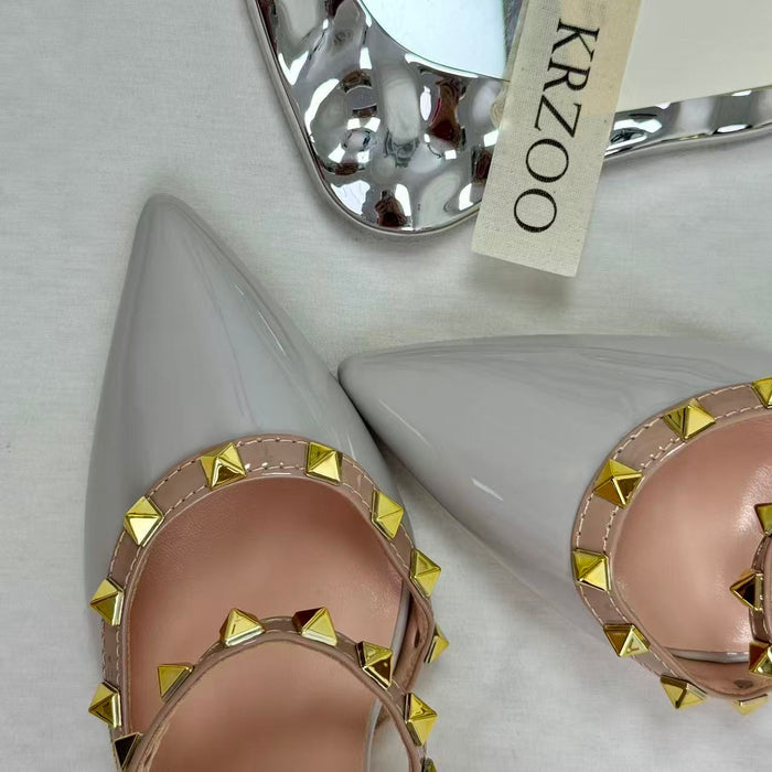 Pointed-nose rivet hollow-heeled shoes
