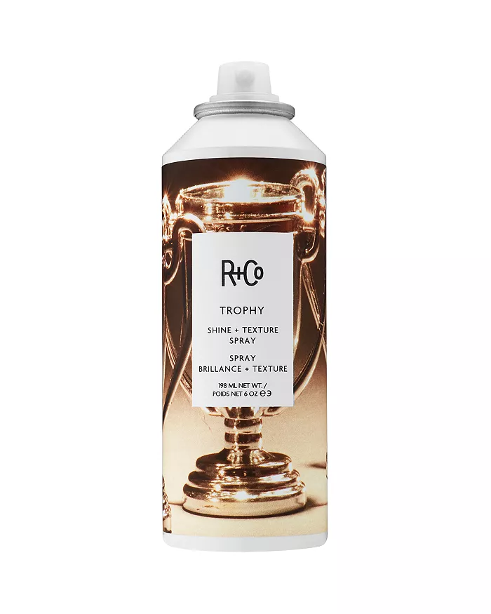 R+Co TROPHY spray, shine and texture hair spray, dry shine styling spray, flexible hold volume spray, selfie-ready hair product, styling spray with grit and gloss, volumizing shine mist, touchable texture spray, trophy hair spray R+Co, radiant hair finishing spray