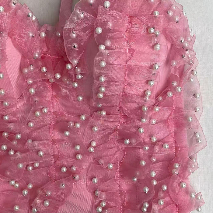 Ruffled-edge elastic pearl plunging top