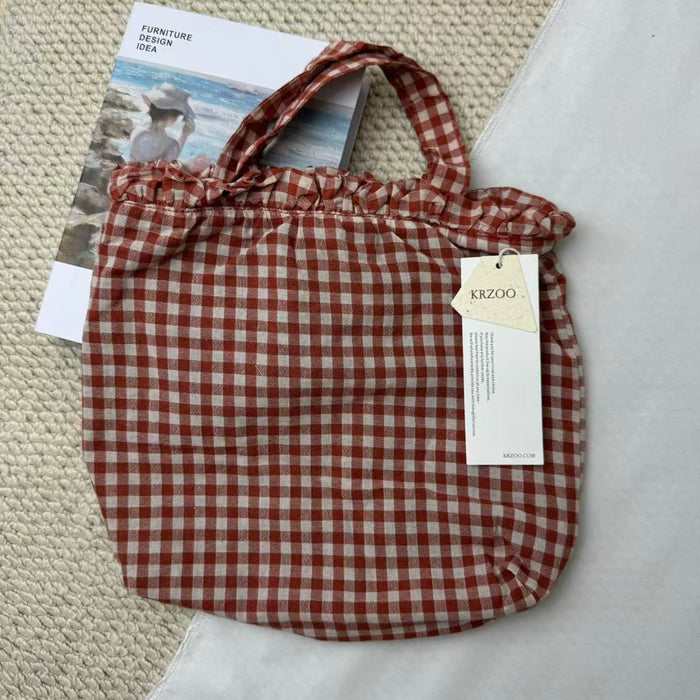 Small Red Handbag With A Checkered Pattern