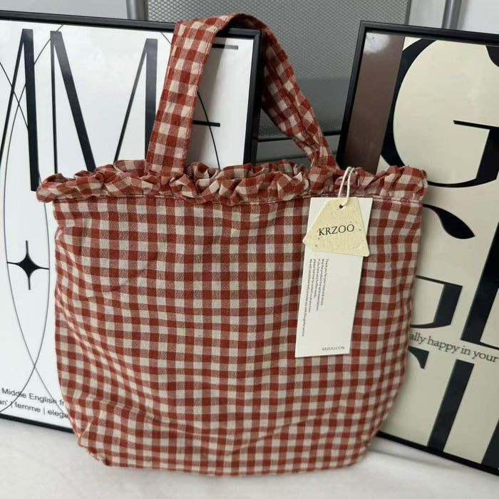 Small Red Handbag With A Checkered Pattern