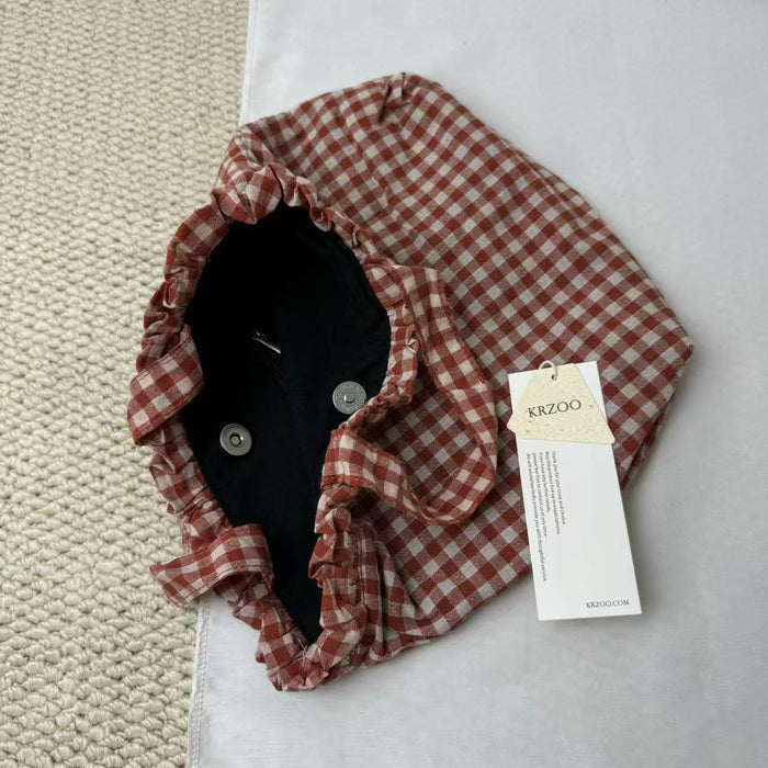 Small Red Handbag With A Checkered Pattern