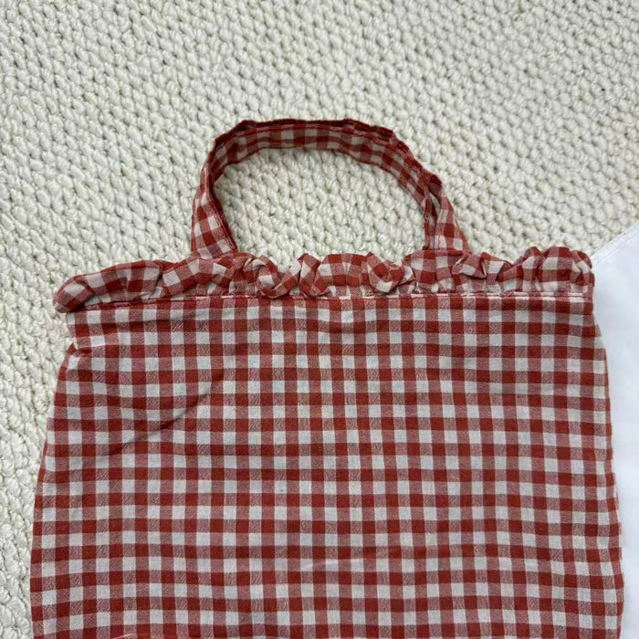 Small Red Handbag With A Checkered Pattern