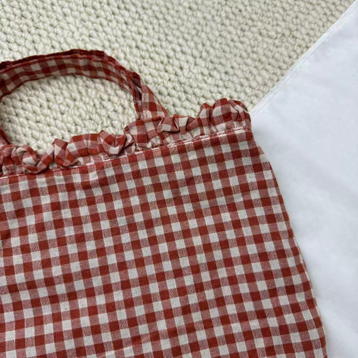 Small Red Handbag With A Checkered Pattern