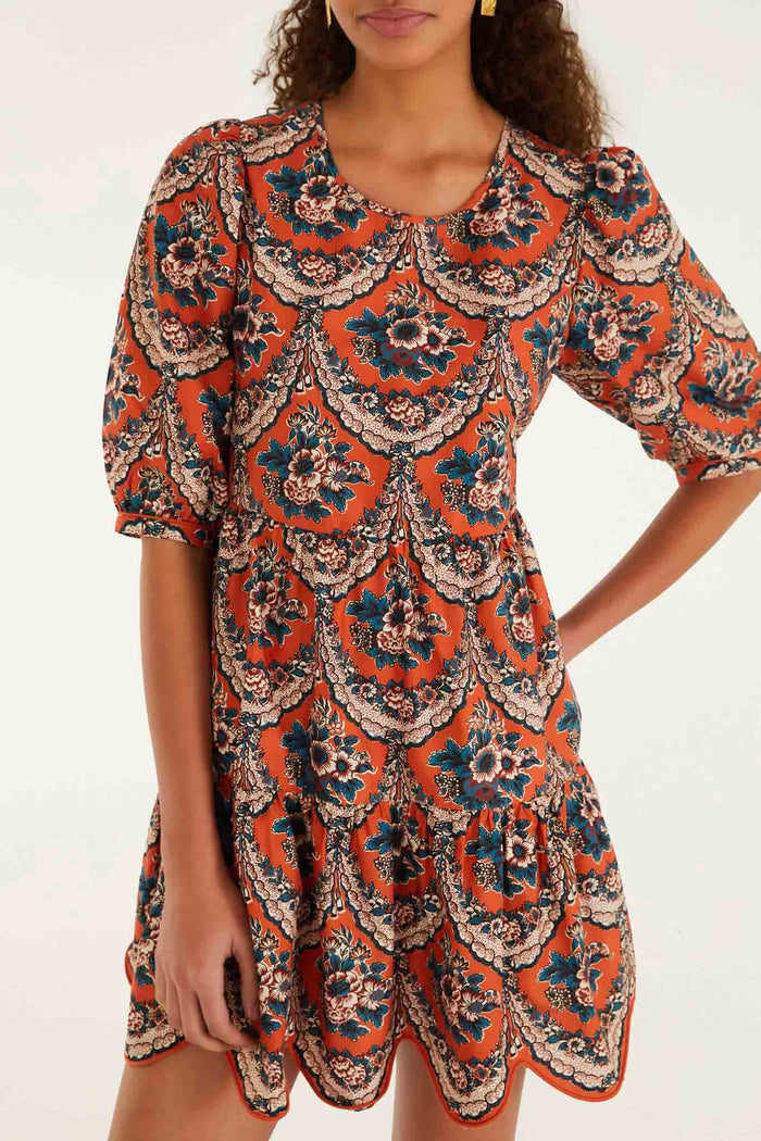 FARM Rio model wearing the Terracotta Victorian Floral Puff Sleeve Mini Dress