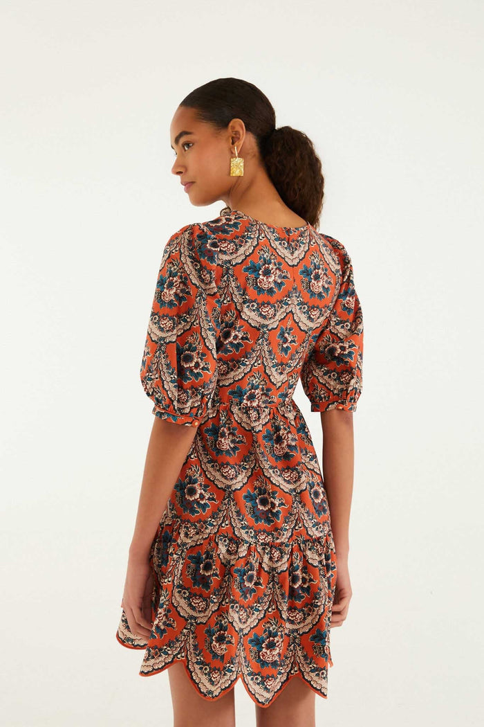 FARM Rio model wearing the Terracotta Victorian Floral Puff Sleeve Mini Dress