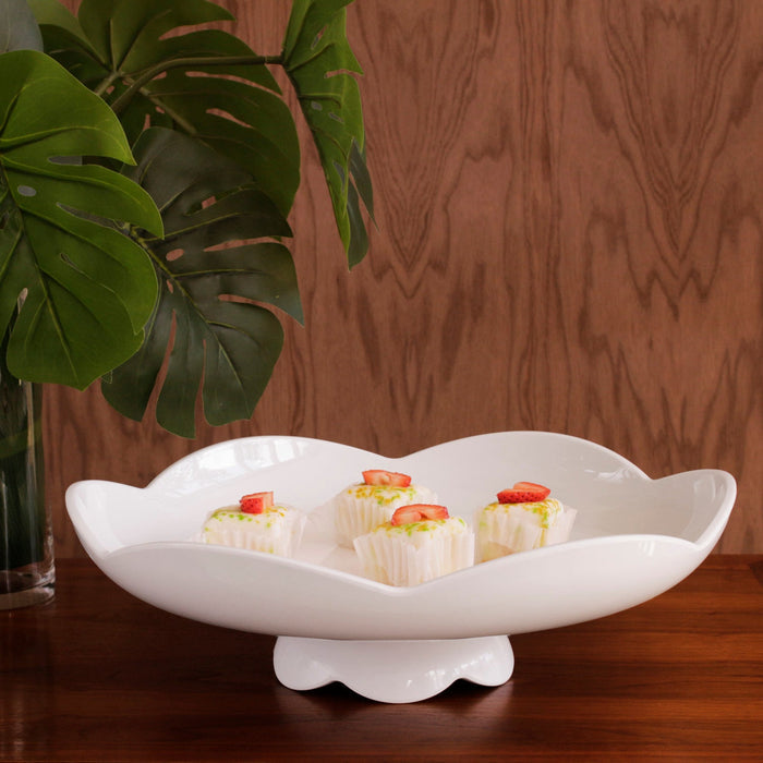 Beatriz Ball Vida Amelia Pedestal Cake Plate White — With small desserts on a wooden surface