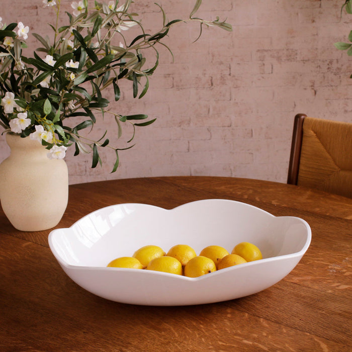 Beatriz Ball Vida Amelia Extra Large Oval Bowl White — With lemons on a wooden dining table