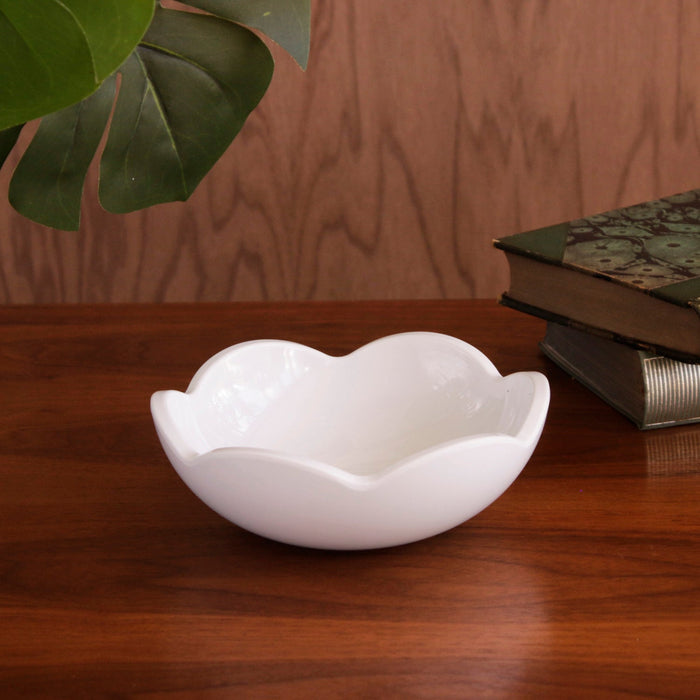 Beatriz Ball Vida Amelia Mini Bowl White — Empty bowl beside books