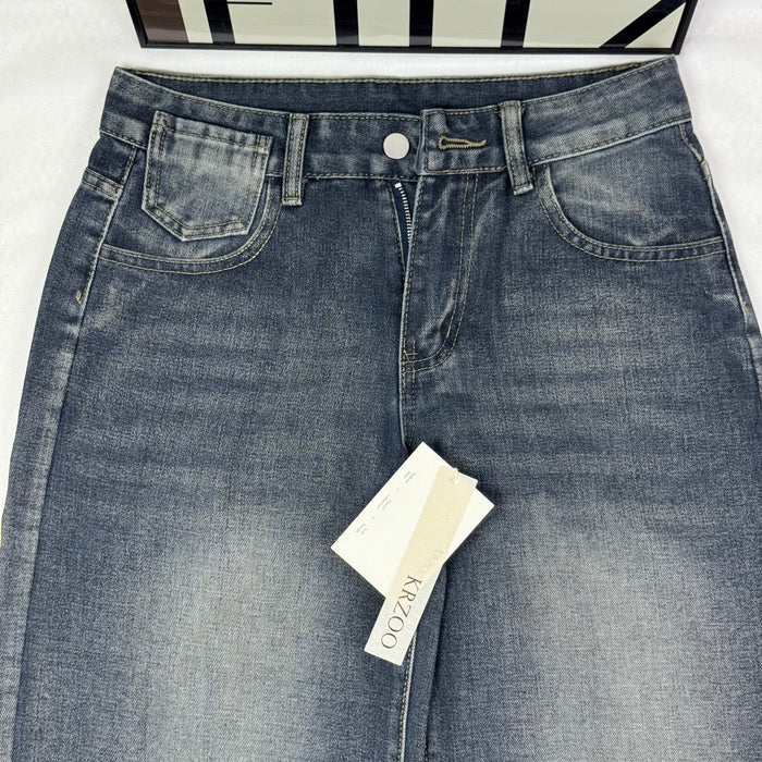 Washed and distressed denim pants