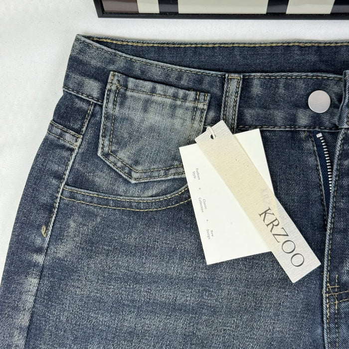 Washed and distressed denim pants